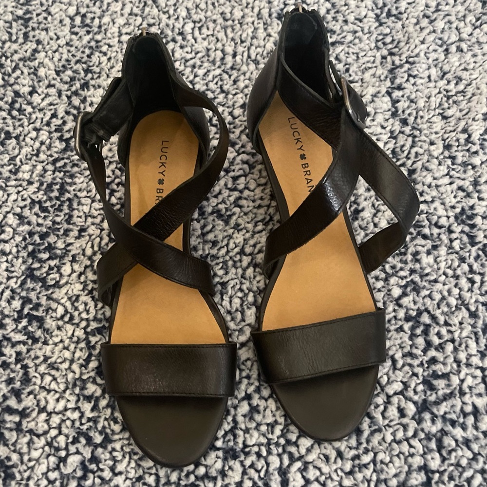 Lucky Brand Black Leather Criss across Black leather wedge sandals. 8.5 like new